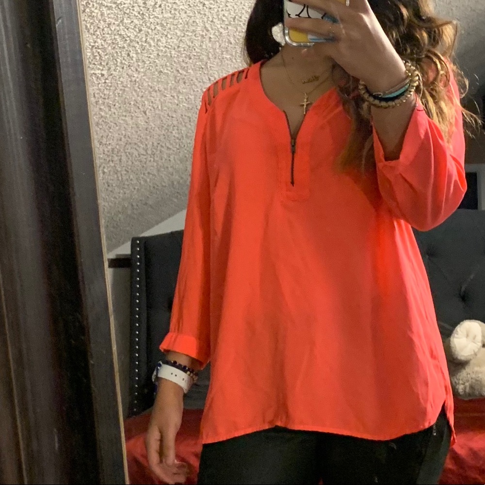 Peach colored blouse